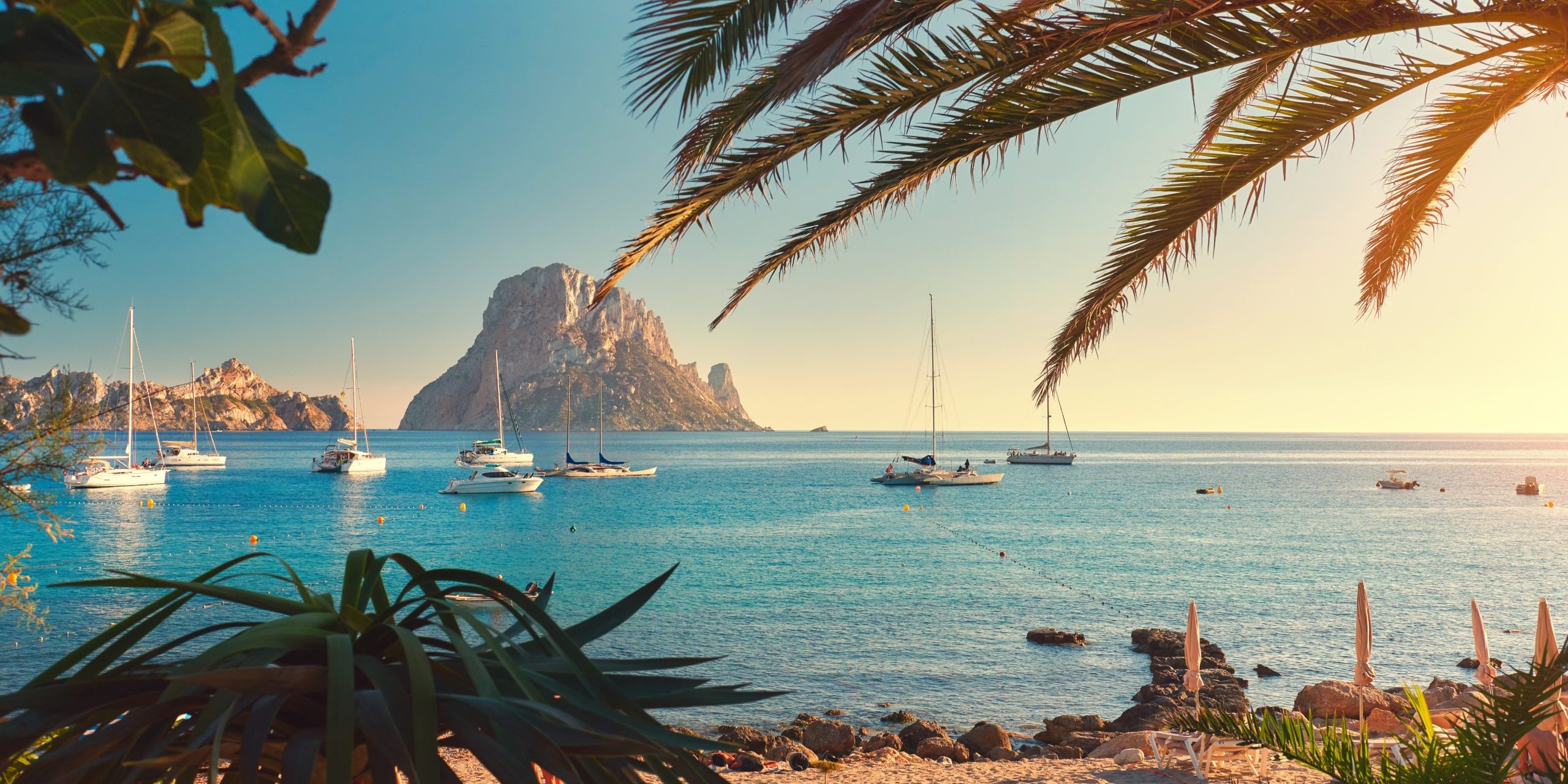 Scenic View Of Sea Against Sky alquiler de coche económico en Ibiza
